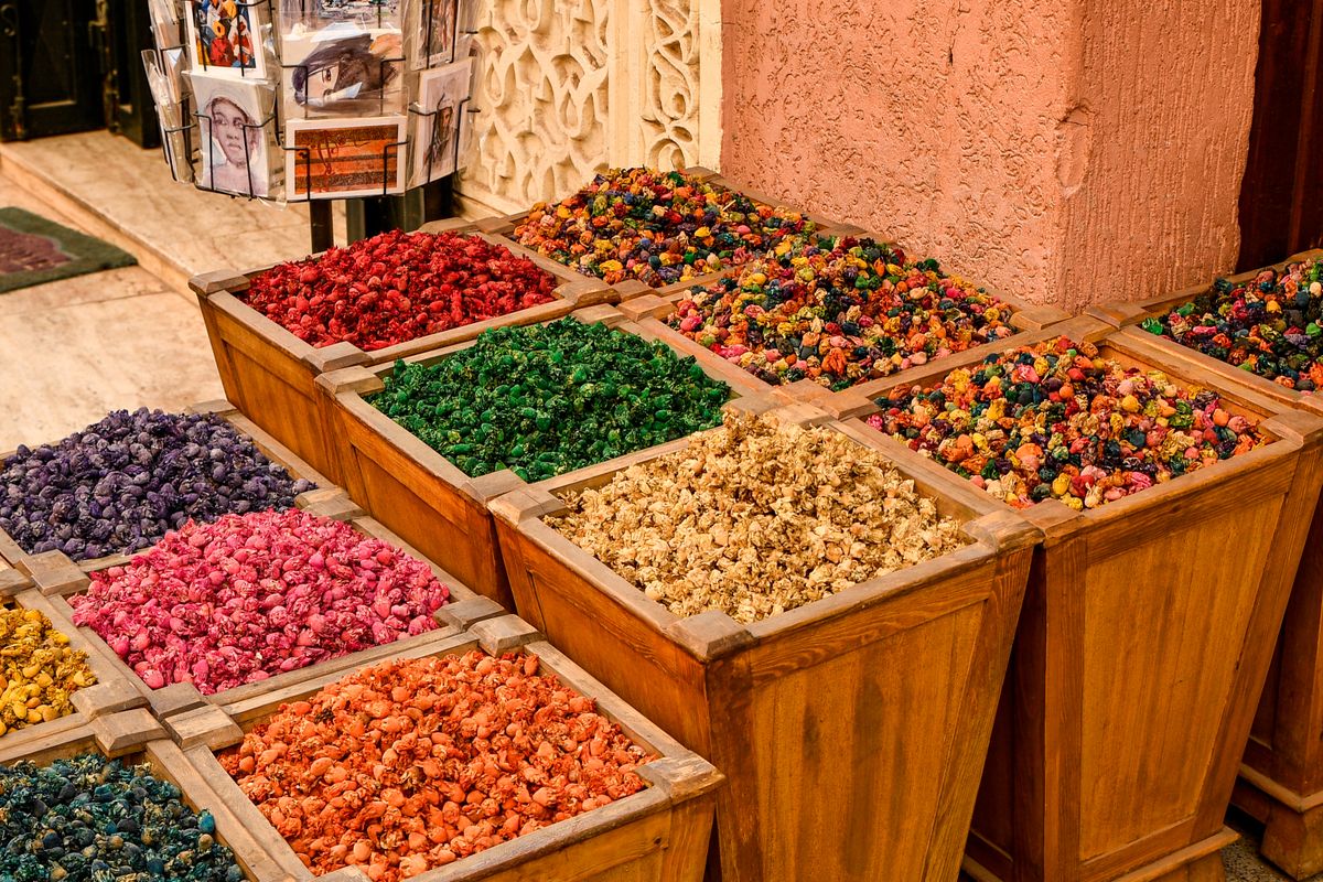 Colourful piles of spices for sale at a market in Marrakech, Morocco