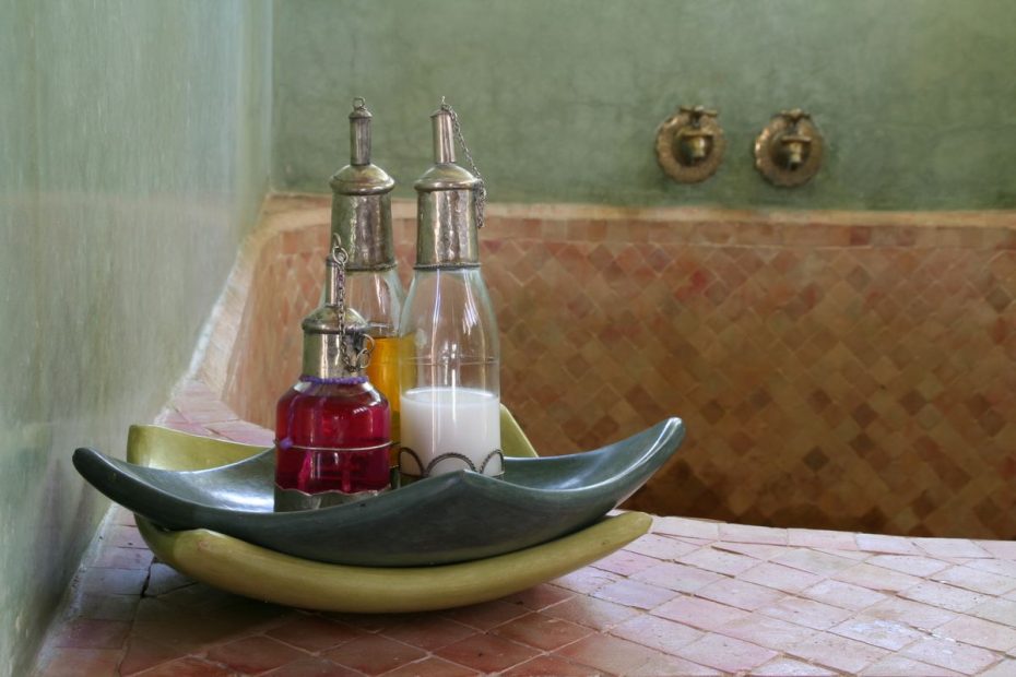 Interior of a traditional Moroccan hammam in Marrakech with oils prepared for a treatment