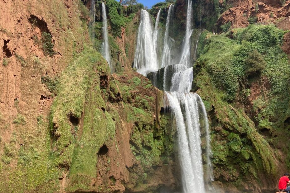 Ouzoud Waterfalls cascading into a green pool in the Atlas Mountains, Morocco