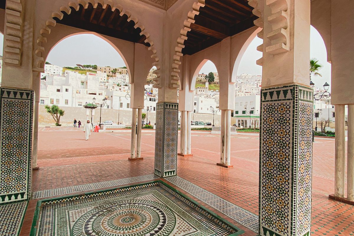 Colourful zellige tiles and carved arches of traditional architecture in Tetouan, Morocco